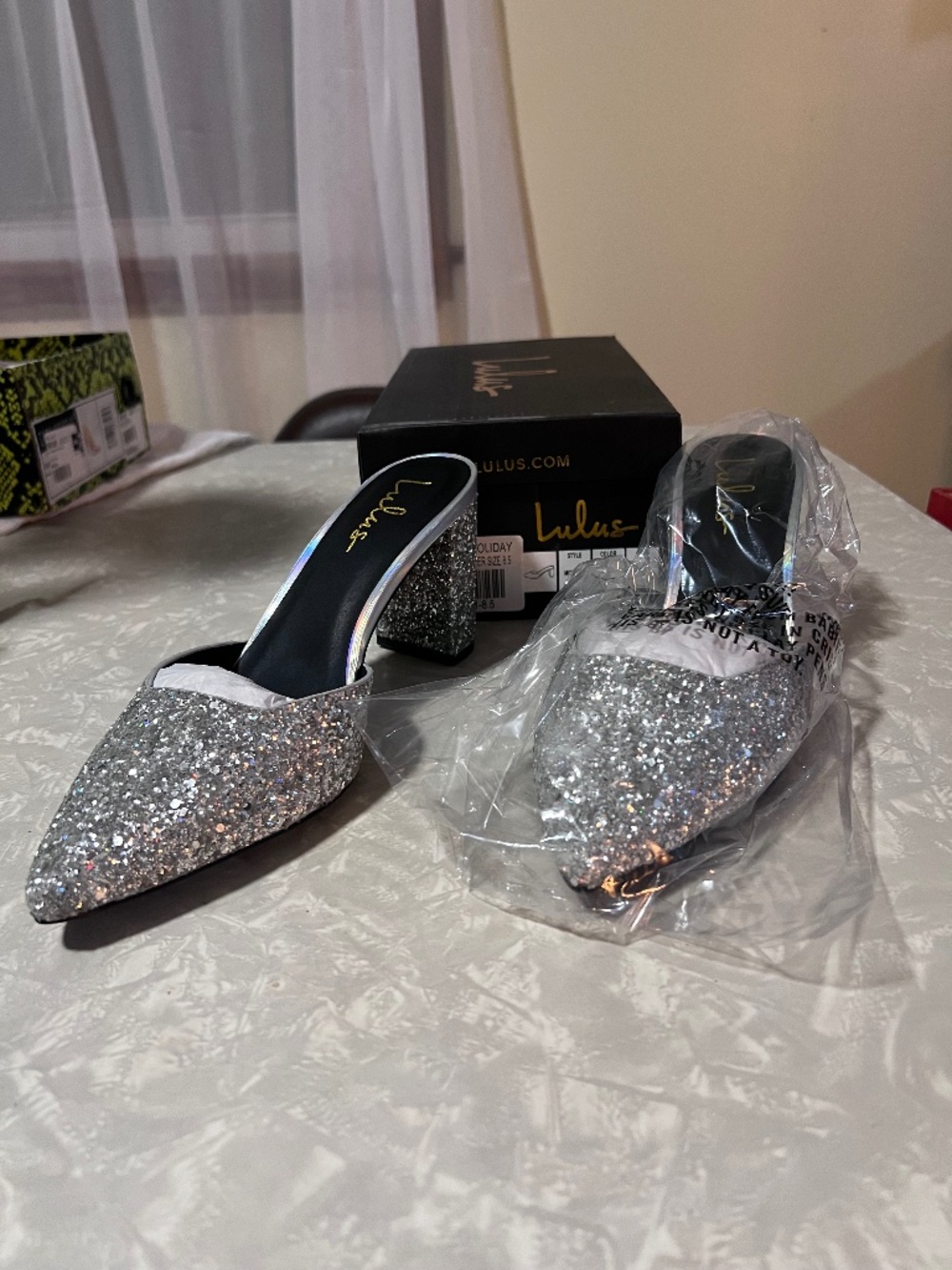 Lulu’s Silver and Glitter Heels